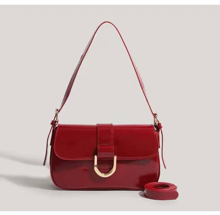 Glossy red shoulder bag